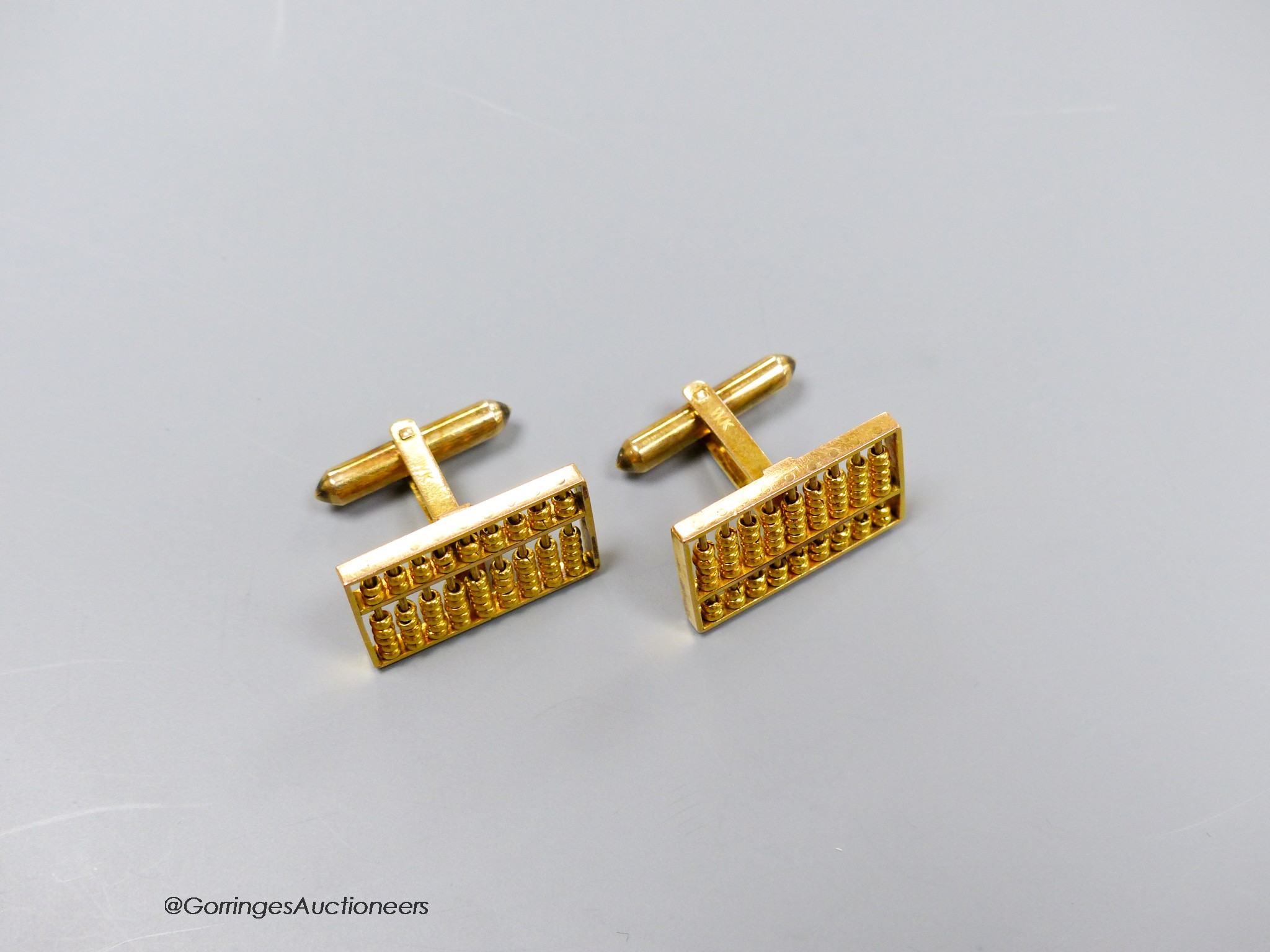 A pair of 14k yellow metal 